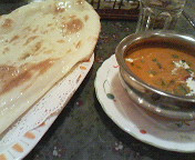 ��[��